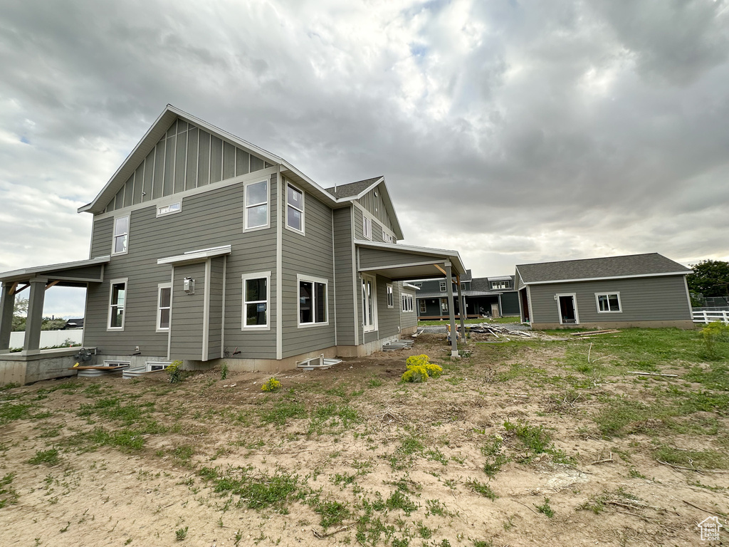 Back of house with board and batten siding