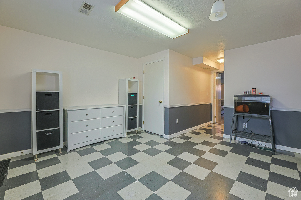 Interior space featuring tile patterned floors