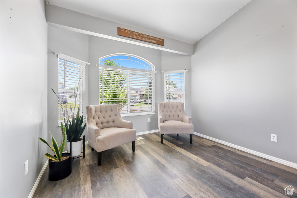 Sitting room featuring dark hardwood / wood-style flooring