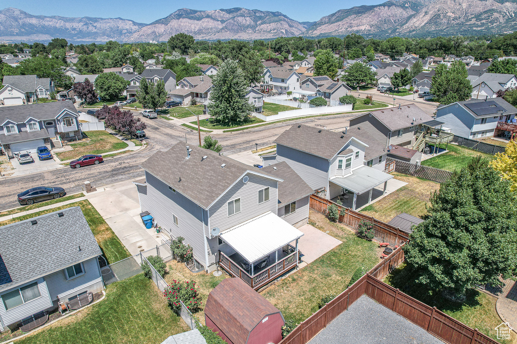 Birds eye view of property featuring a mountain view