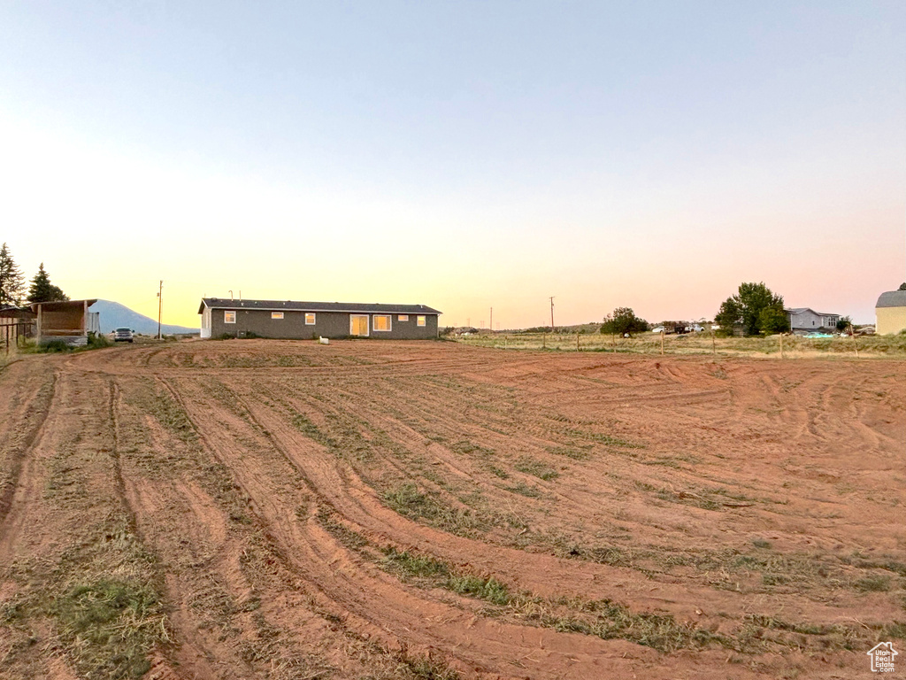 View of yard at dusk