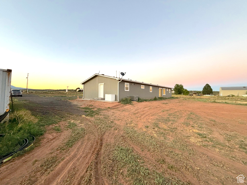 View of yard at dusk