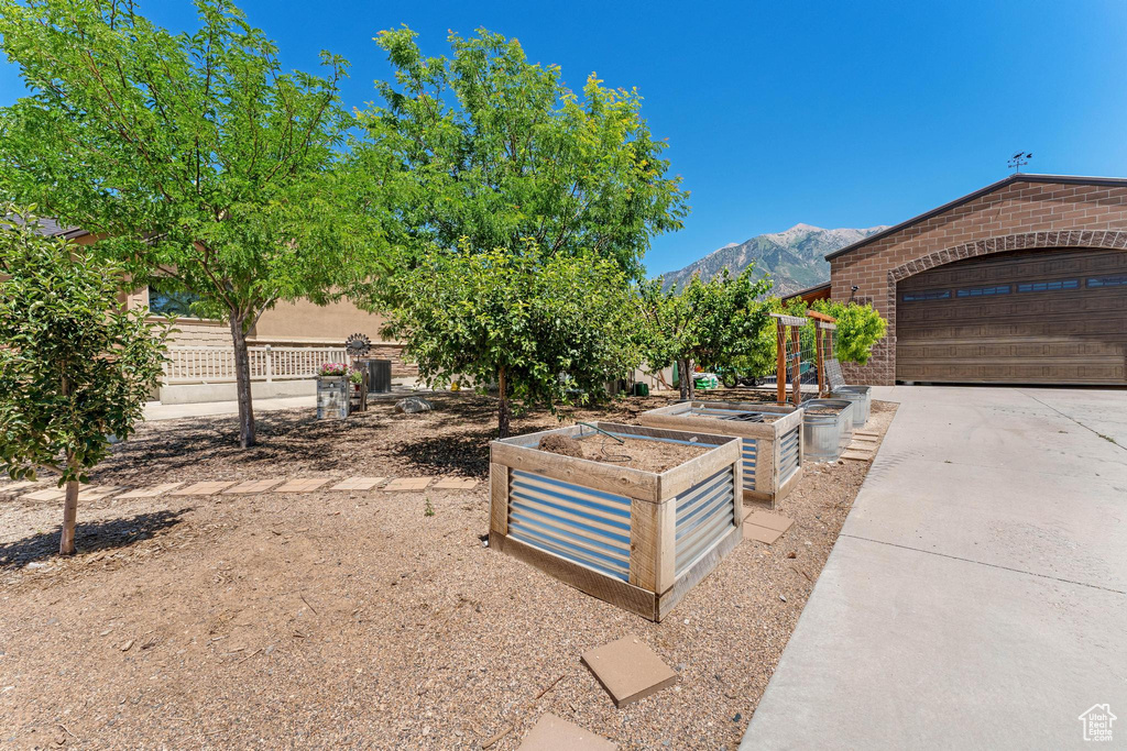 View of front of home with a mountain view