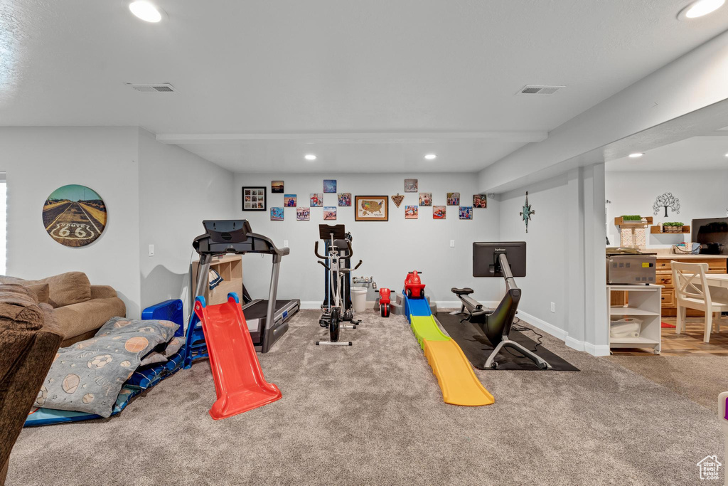 Workout room with carpet flooring