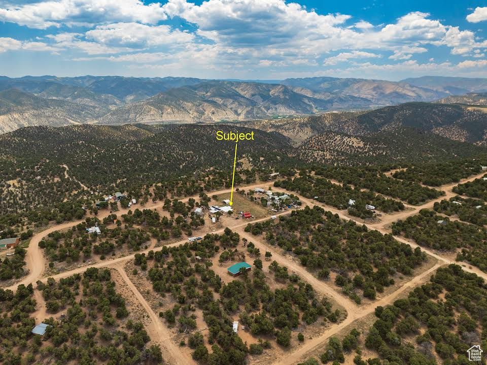 Aerial view featuring a mountain view