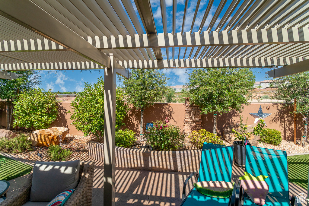 View of patio / terrace featuring a pergola and an outdoor hangout area