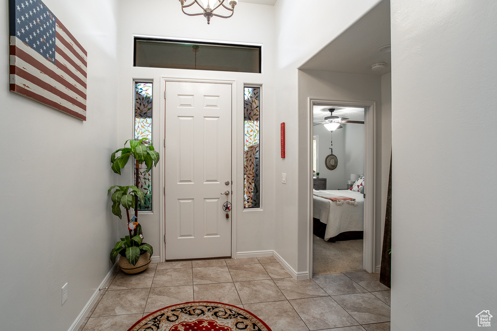 Tiled entryway with ceiling fan