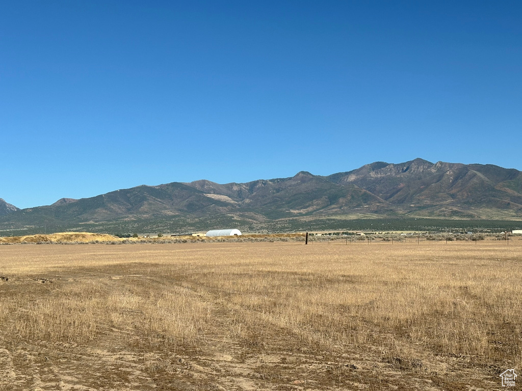 Property view of mountains featuring a rural view