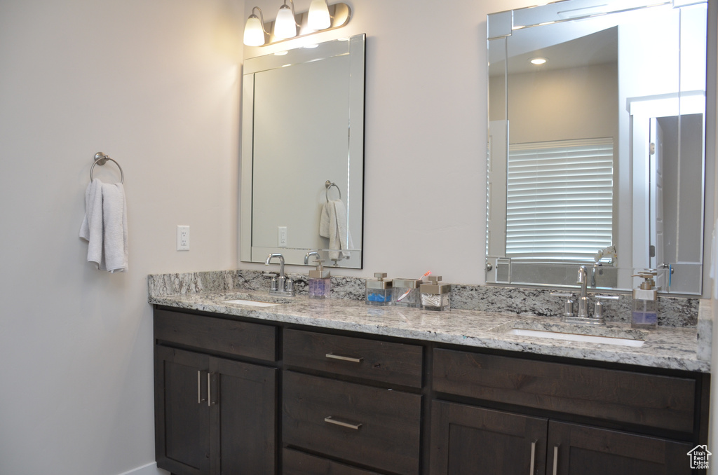 Bathroom featuring dual vanity