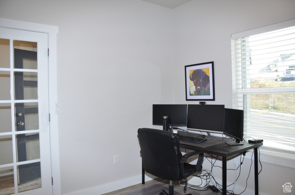 Office featuring wood-type flooring