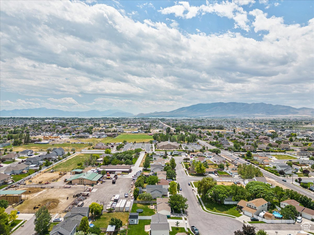 Birds eye view of property with a mountain view