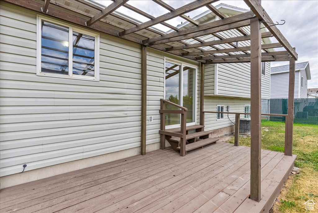 Wooden terrace with a pergola