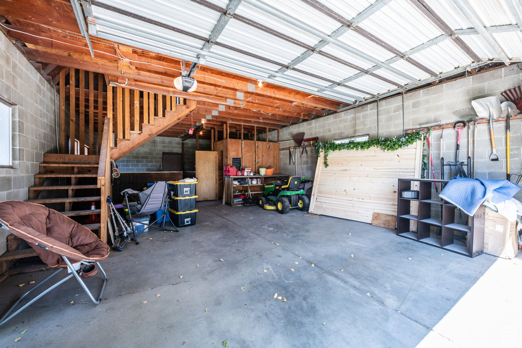 Garage featuring a garage door opener