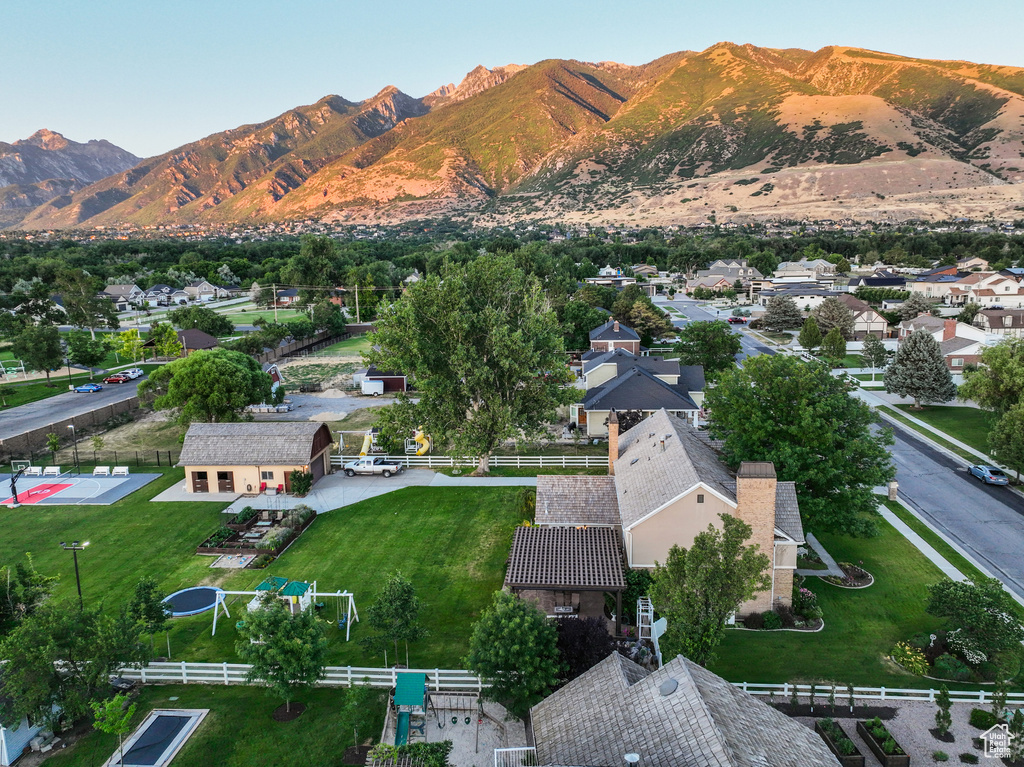 Birds eye view of property with a mountain view