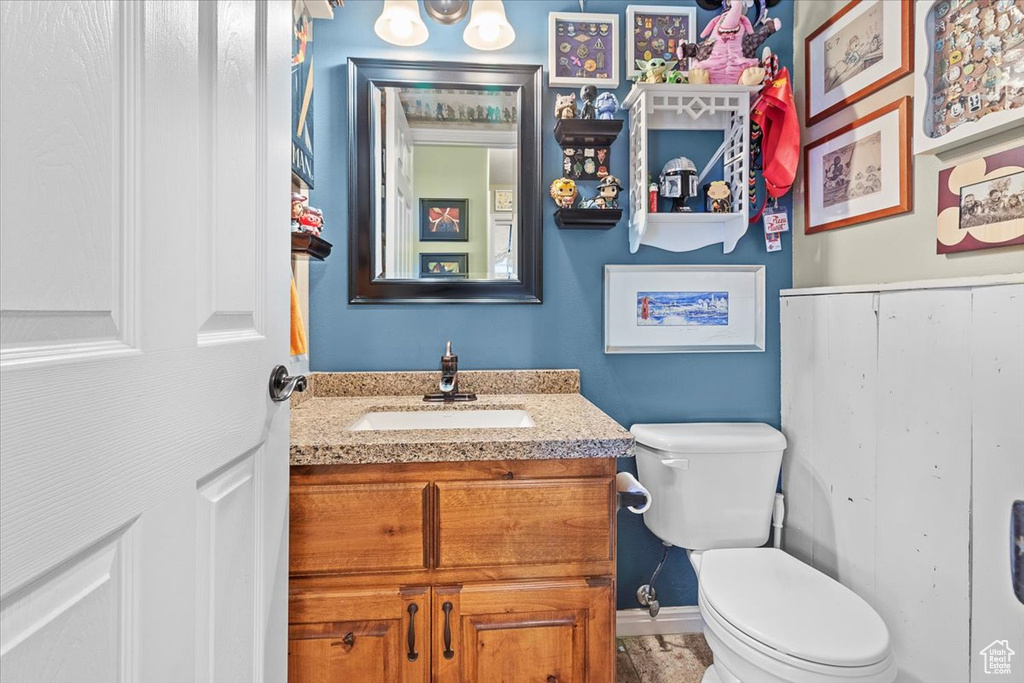 Bathroom with vanity and toilet