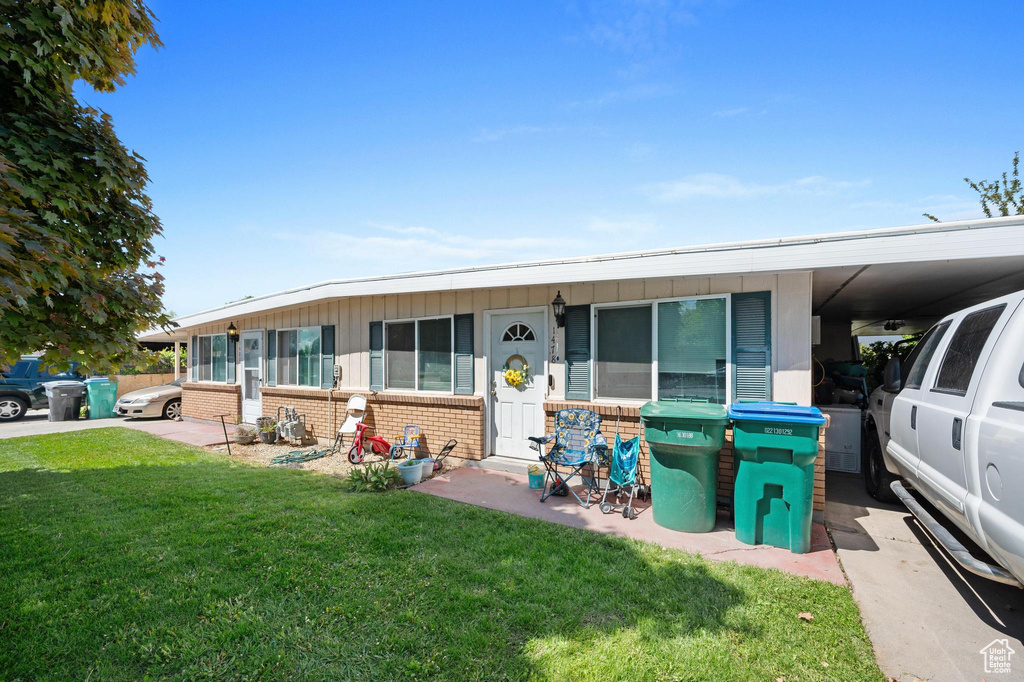 View of front of home with a front yard