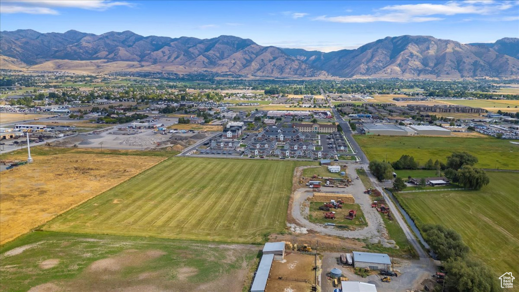 Birds eye view of property with a rural view and a mountain view