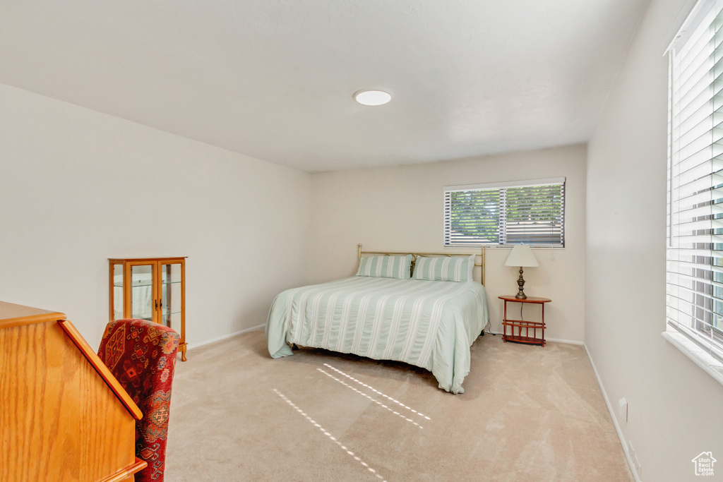 Bedroom featuring carpet flooring