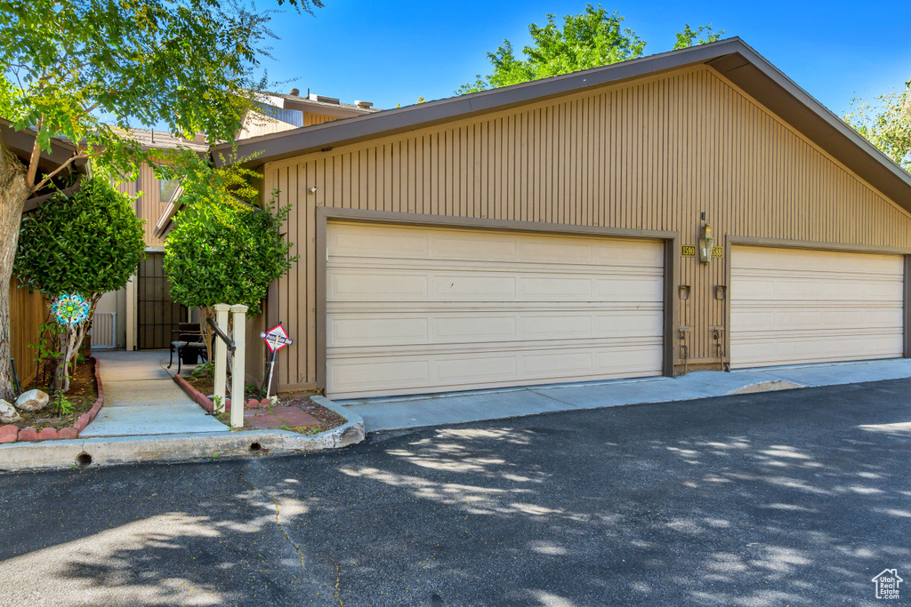 View of front of property with a garage