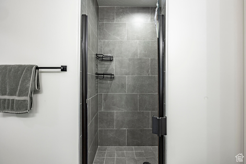 Bathroom featuring an enclosed shower