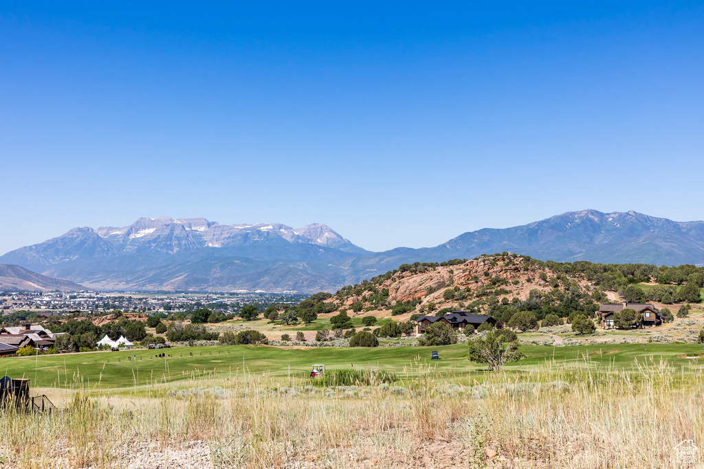 Property view of mountains with a rural view