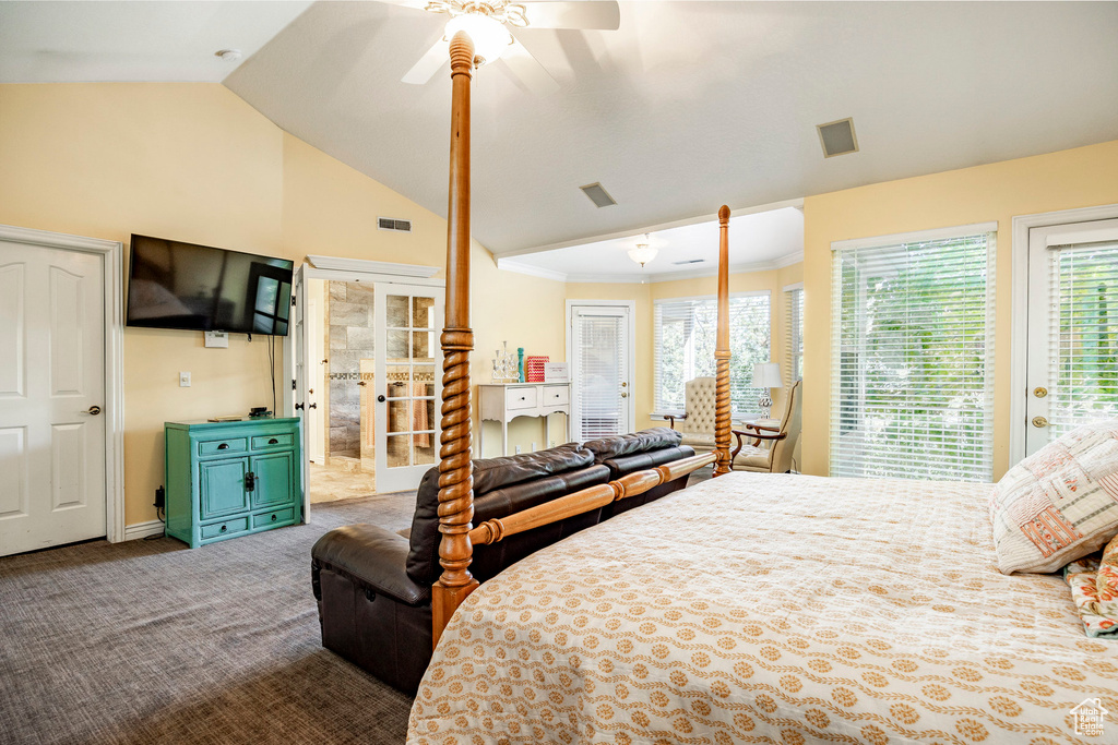 Bedroom with carpet, french doors, access to outside, ceiling fan, and lofted ceiling