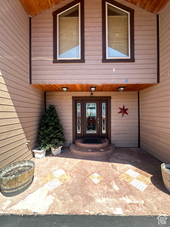 Entrance to property featuring french doors