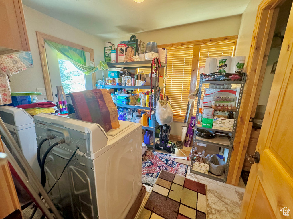 Washroom featuring independent washer and dryer