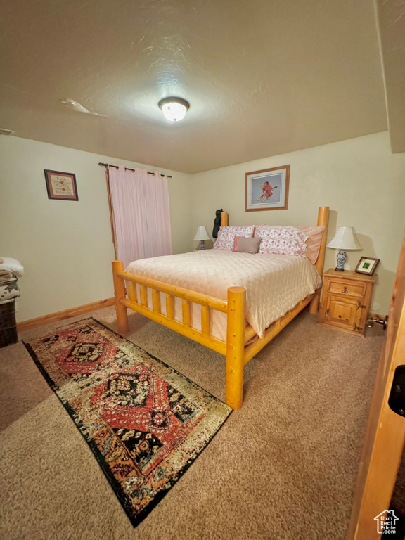 Bedroom with carpet floors