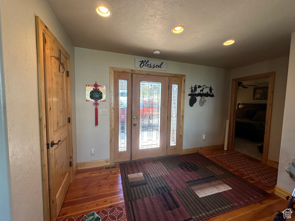 Foyer featuring dark hardwood / wood-style floors