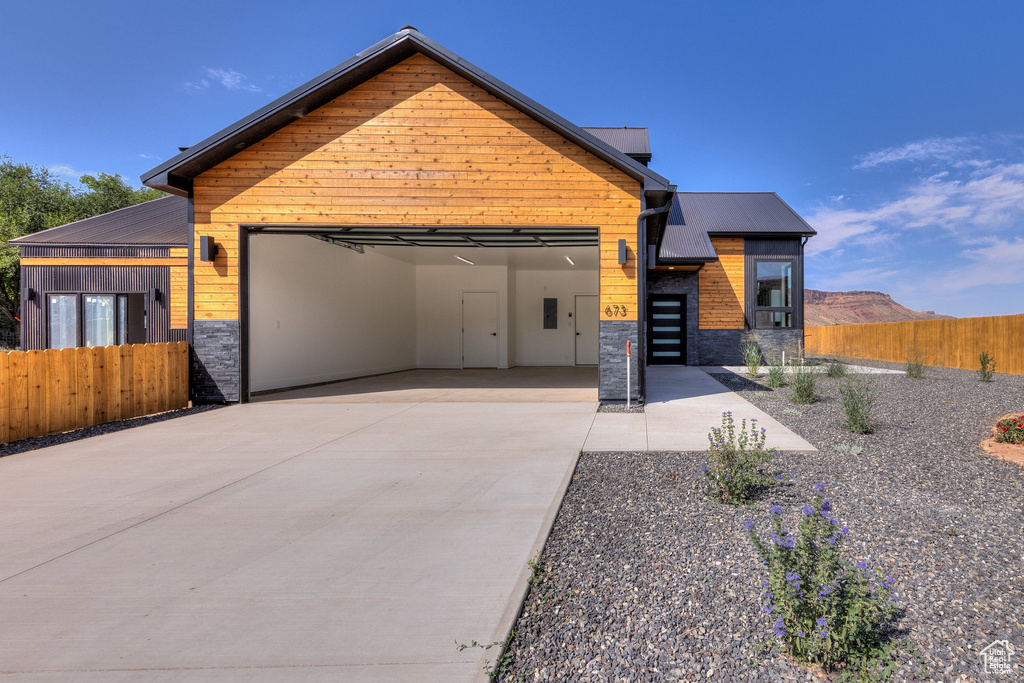 Contemporary home featuring a mountain view