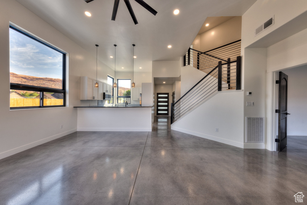 Unfurnished living room with sink