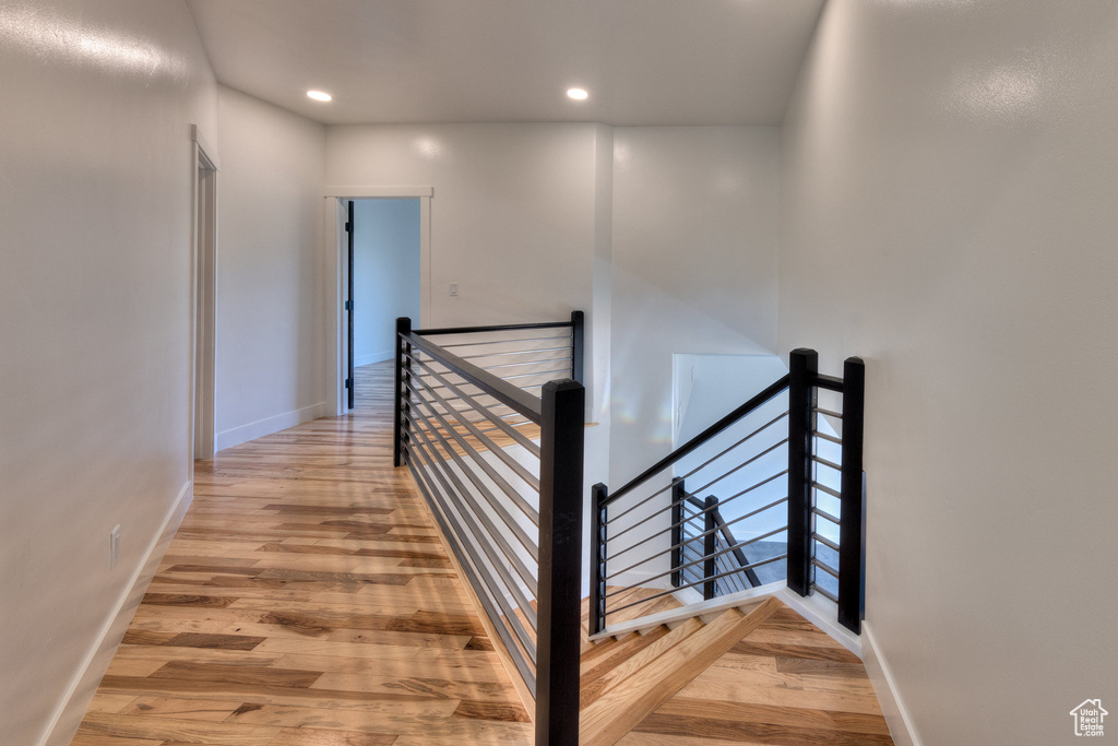 Hall with wood-type flooring