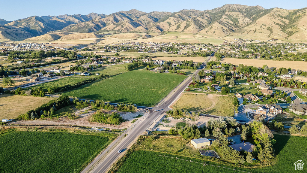 Birds eye view of property featuring a mountain view and a rural view
