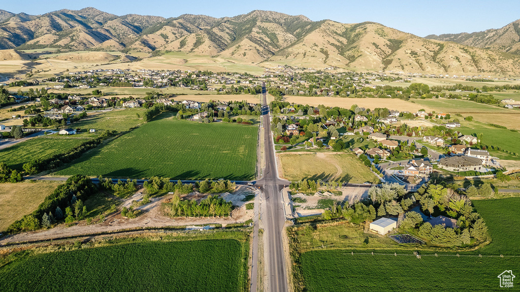 Drone / aerial view featuring a mountain view and a rural view