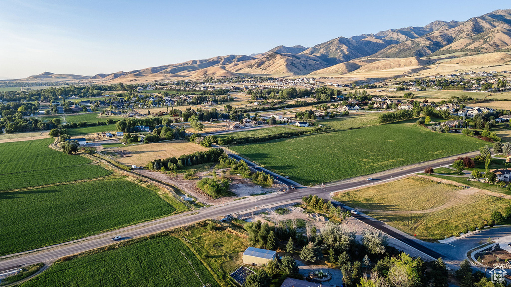 Drone / aerial view with a mountain view and a rural view