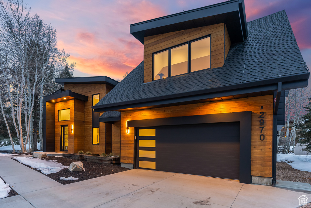 Contemporary house featuring a garage