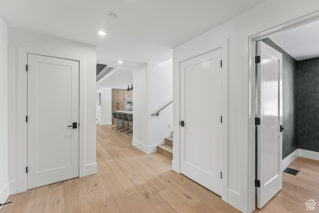 Hall featuring light hardwood / wood-style floors