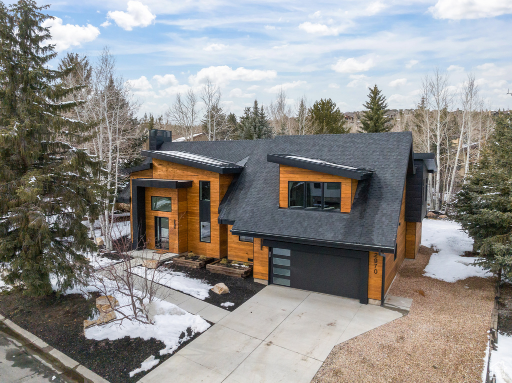 Contemporary house featuring a garage