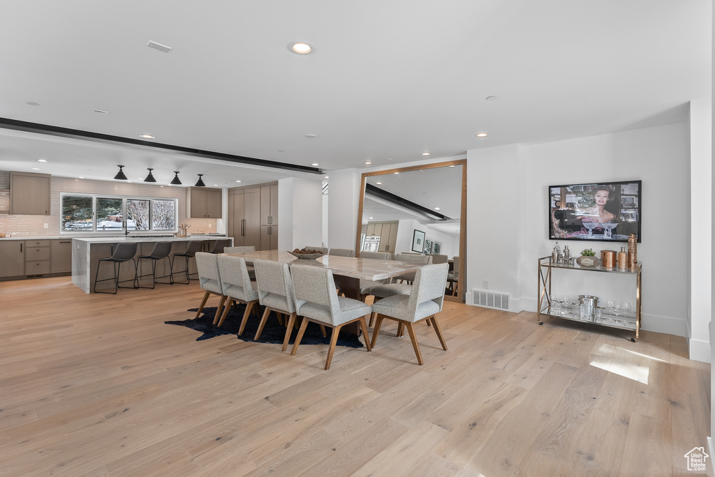 Dining area featuring light wood-type flooring