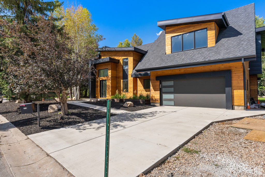 Contemporary home featuring a garage