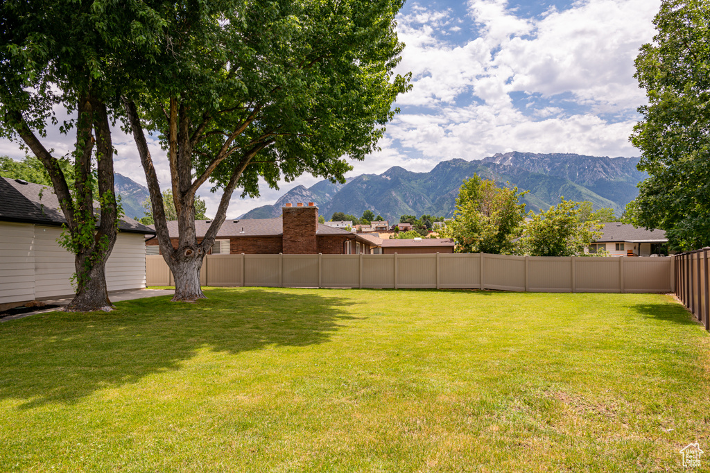 View of yard featuring a mountain view