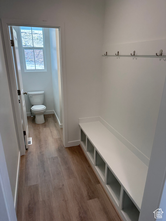 Mudroom with light wood-type flooring