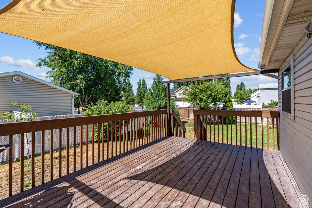 Wooden deck with a yard