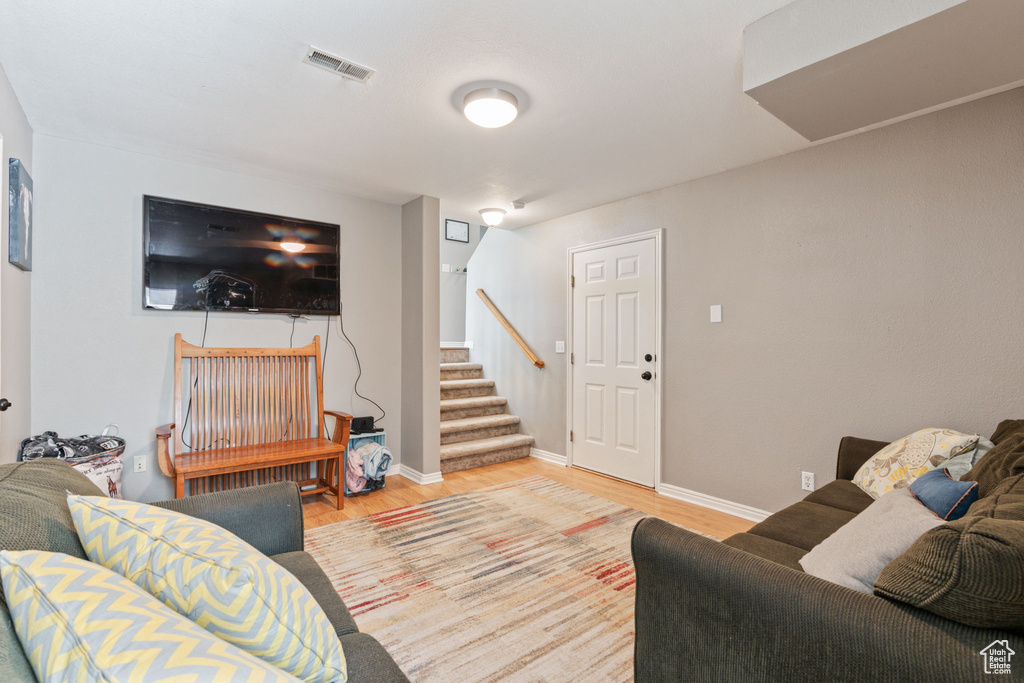 Living room featuring hardwood / wood-style floors