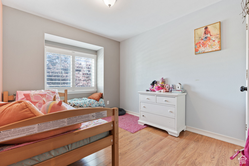 Bedroom featuring light wood-type flooring