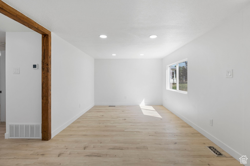 Unfurnished room featuring light hardwood / wood-style floors