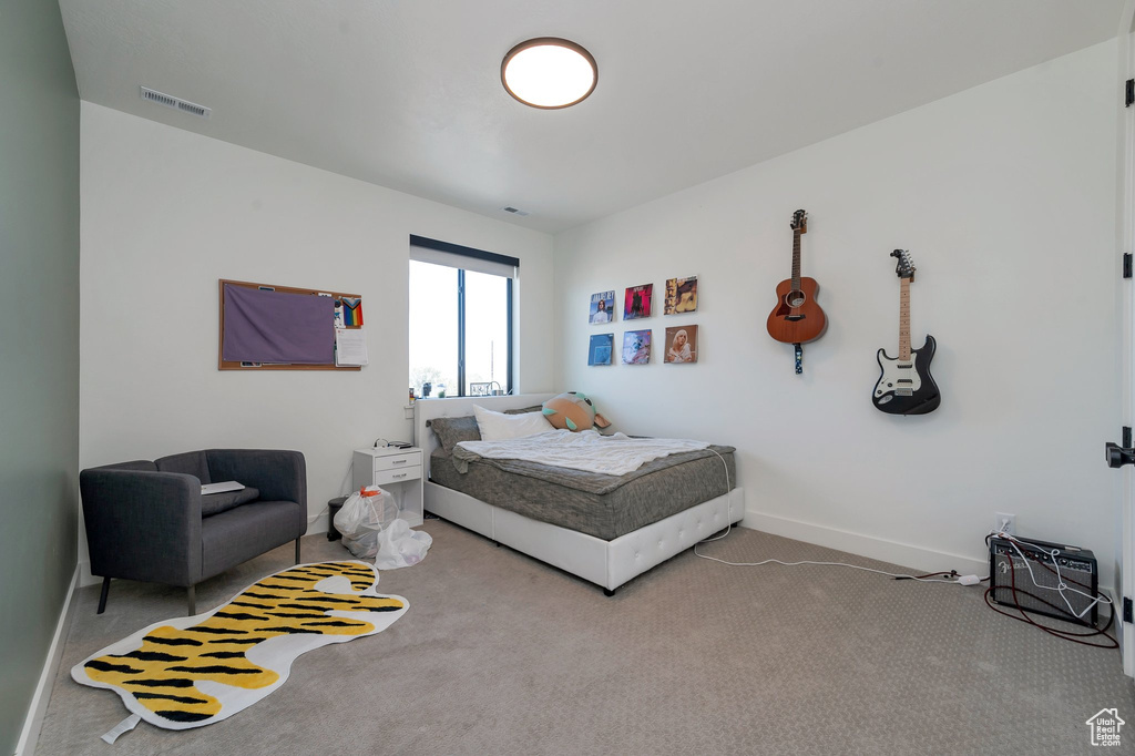 View of carpeted bedroom