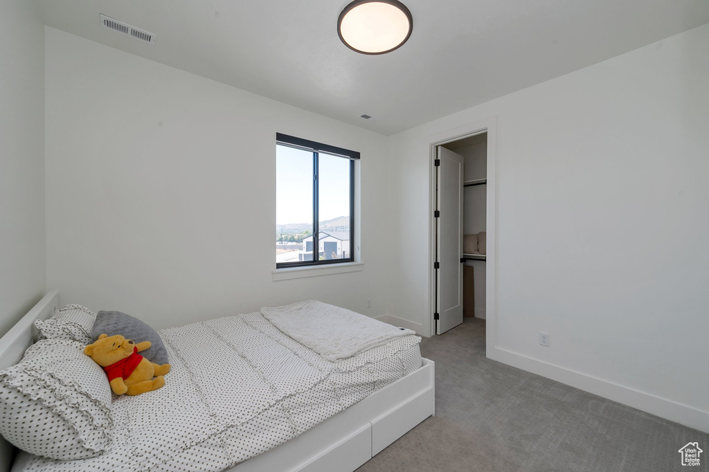 Bedroom featuring carpet floors