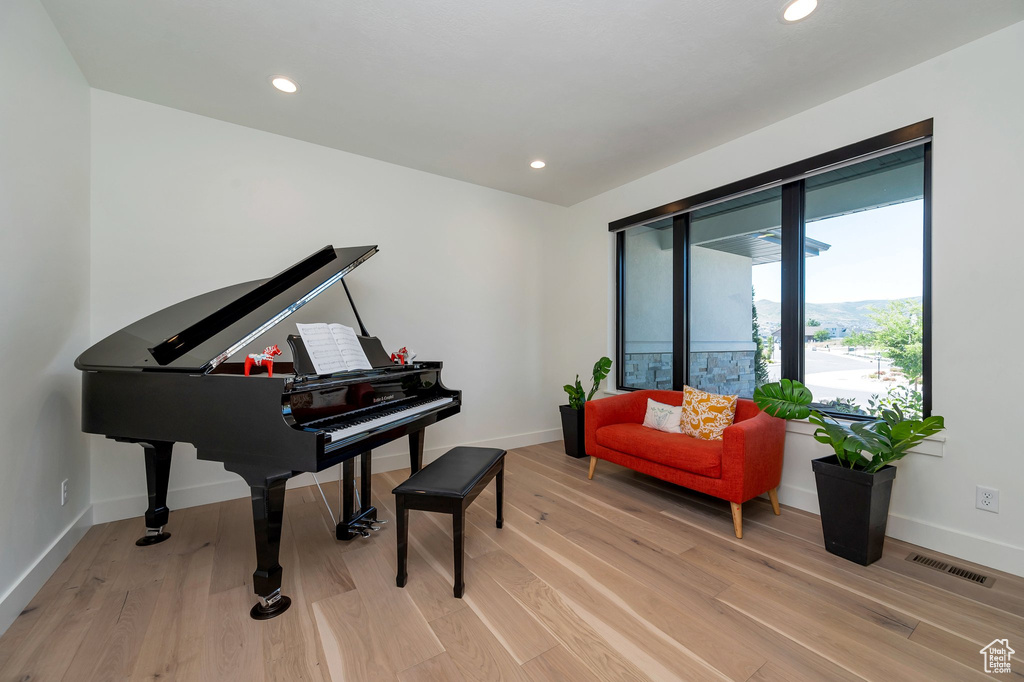 Interior space with light hardwood / wood-style flooring